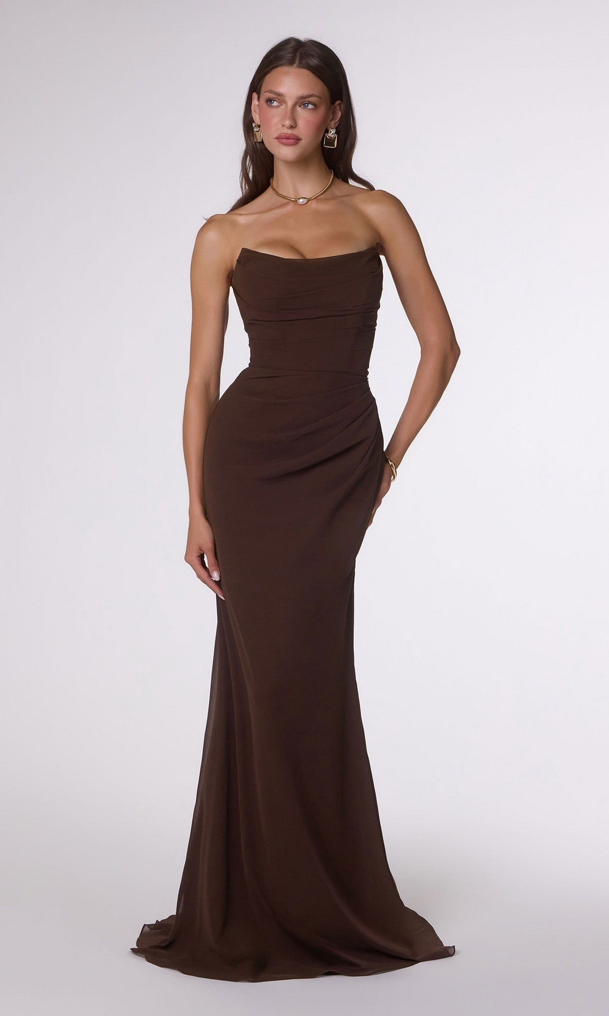 A woman in the Lace-Up Strapless Prom Gown: Amoris T702 stands against a plain light background.